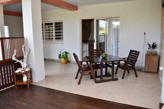 closer view of large front covered verandah at Aito